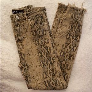Tan snake skin printed skinny jeans